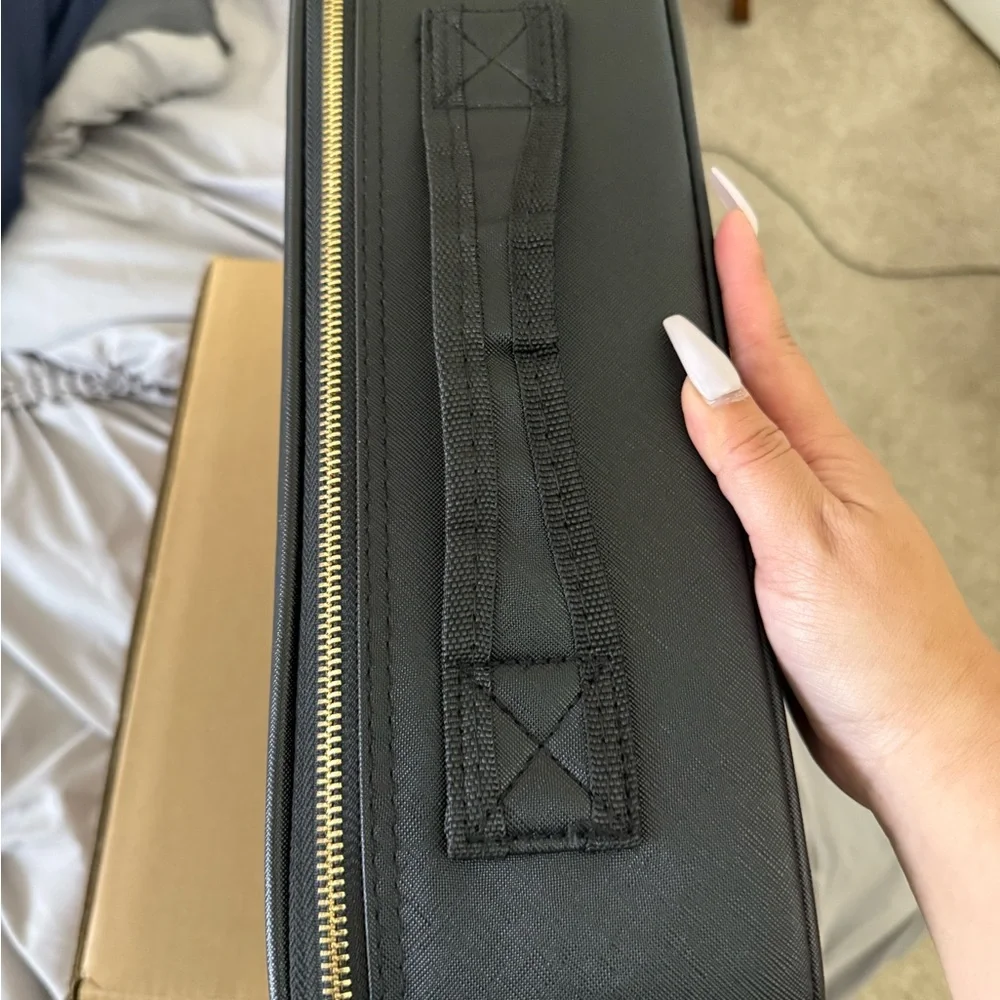 Black Makeup Organizer with Multiple Compartments and Portable Design